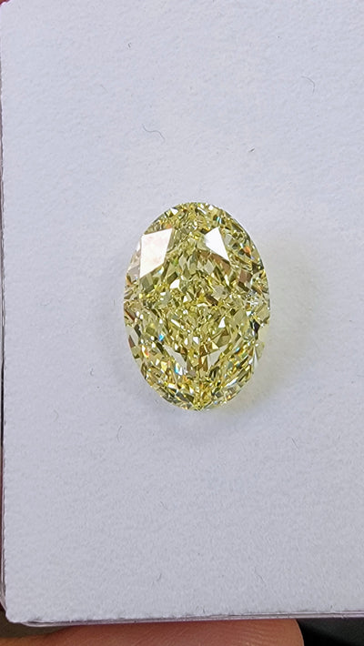 10.11ct Fancy Light Yellow Oval VS2 GIA