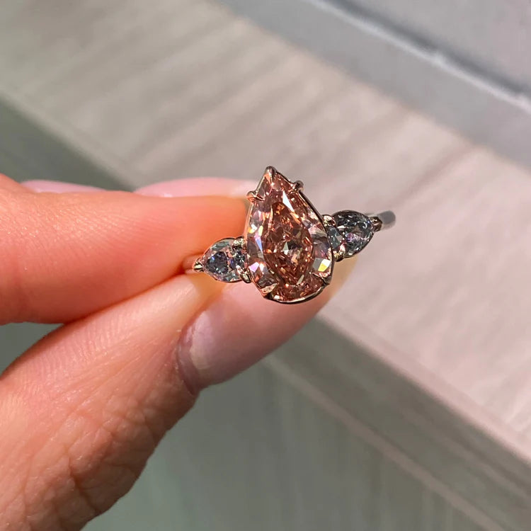 2.22ct Fancy Deep Brown-Pink Pear VS2 GIA Ring with Blue Diamond Sides