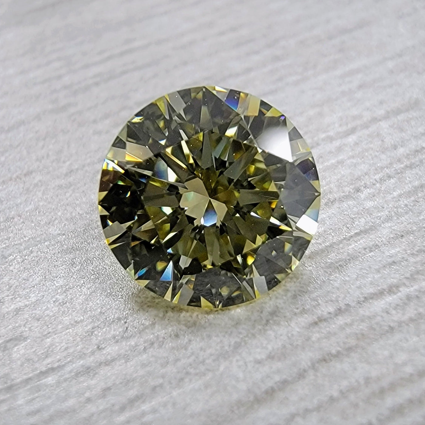 1.06ct Light Yellow Round VVS2 GIA