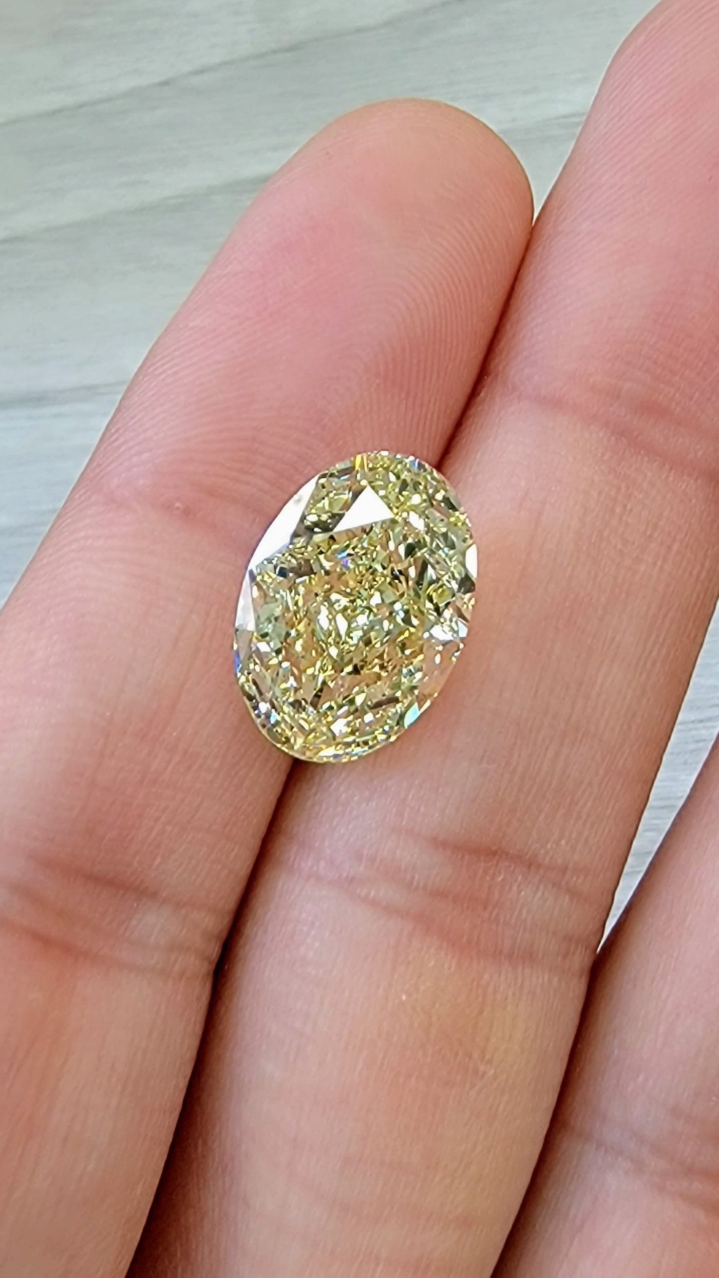 10.11ct Fancy Light Yellow Oval VS2 GIA