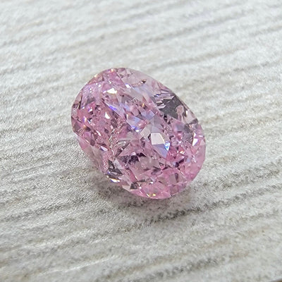 0.50ct Fancy Intense Purplish Pink Oval I1 GIA