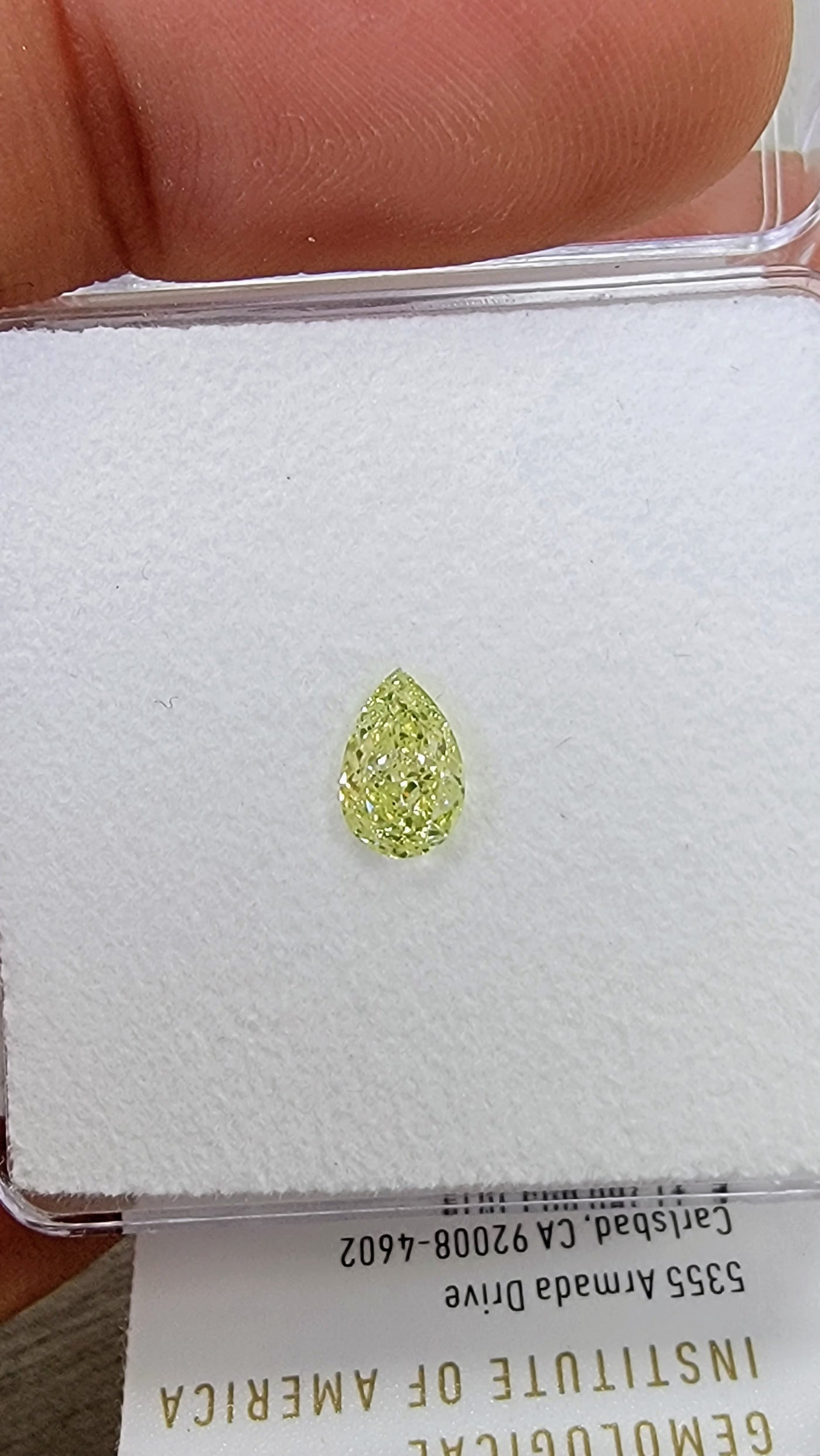 0.75ct Fancy Light Green Yellow NEON Pear VS2 GIA