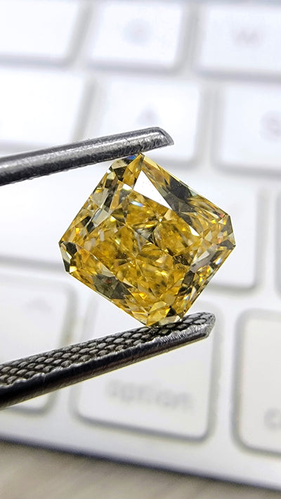 1.37ct Fancy Intense Orangy Yellow Radiant SI1 GIA