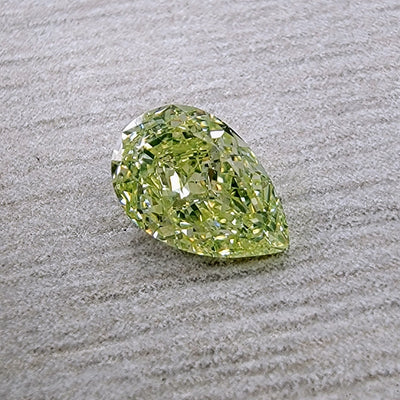 0.75ct Fancy Light Green Yellow NEON Pear VS2 GIA