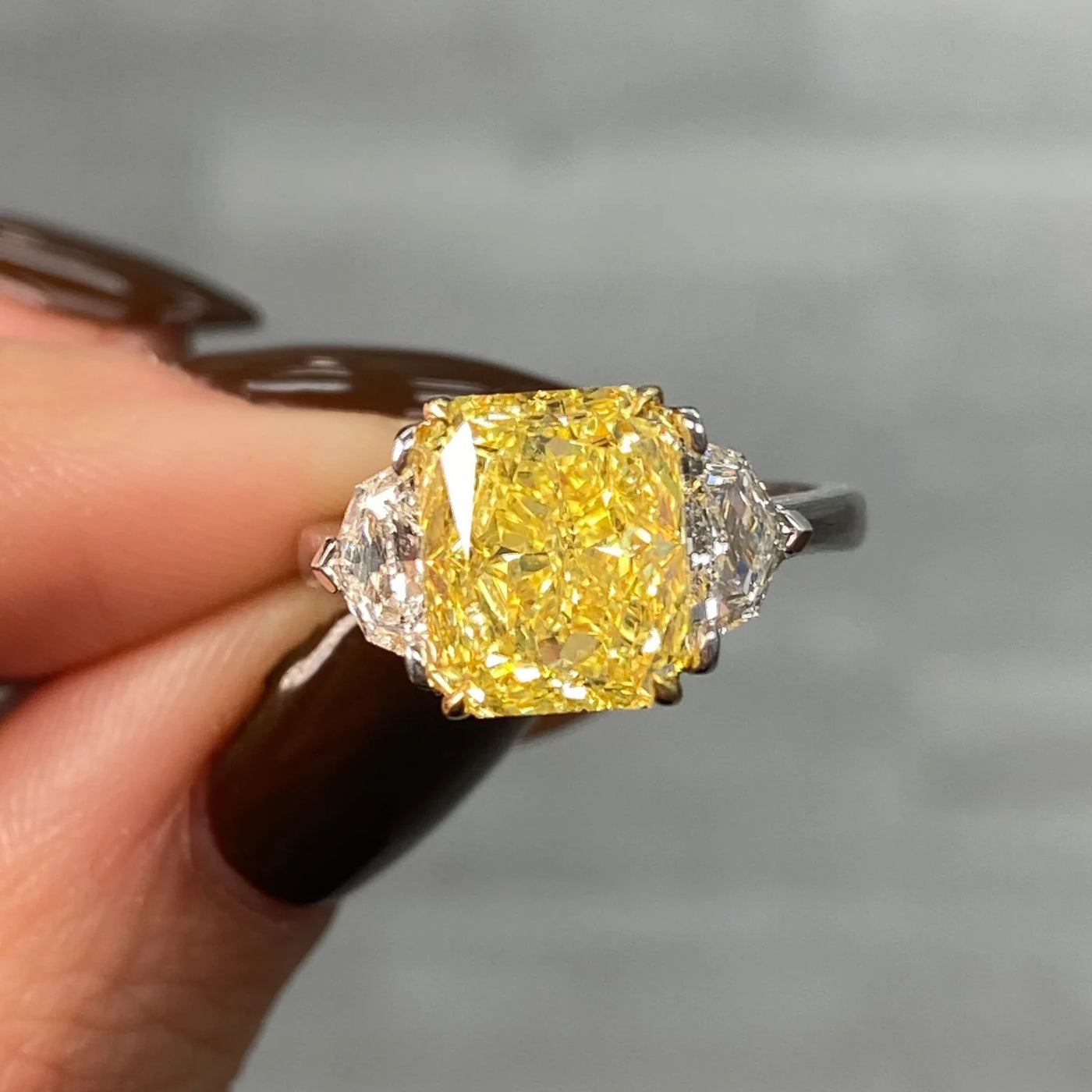 4ct Fancy Vivid Yellow Elongated Radiant Internally Flawless GIA Ring