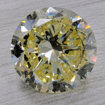 6.04ct Fancy Yellow Round VS1 GIA