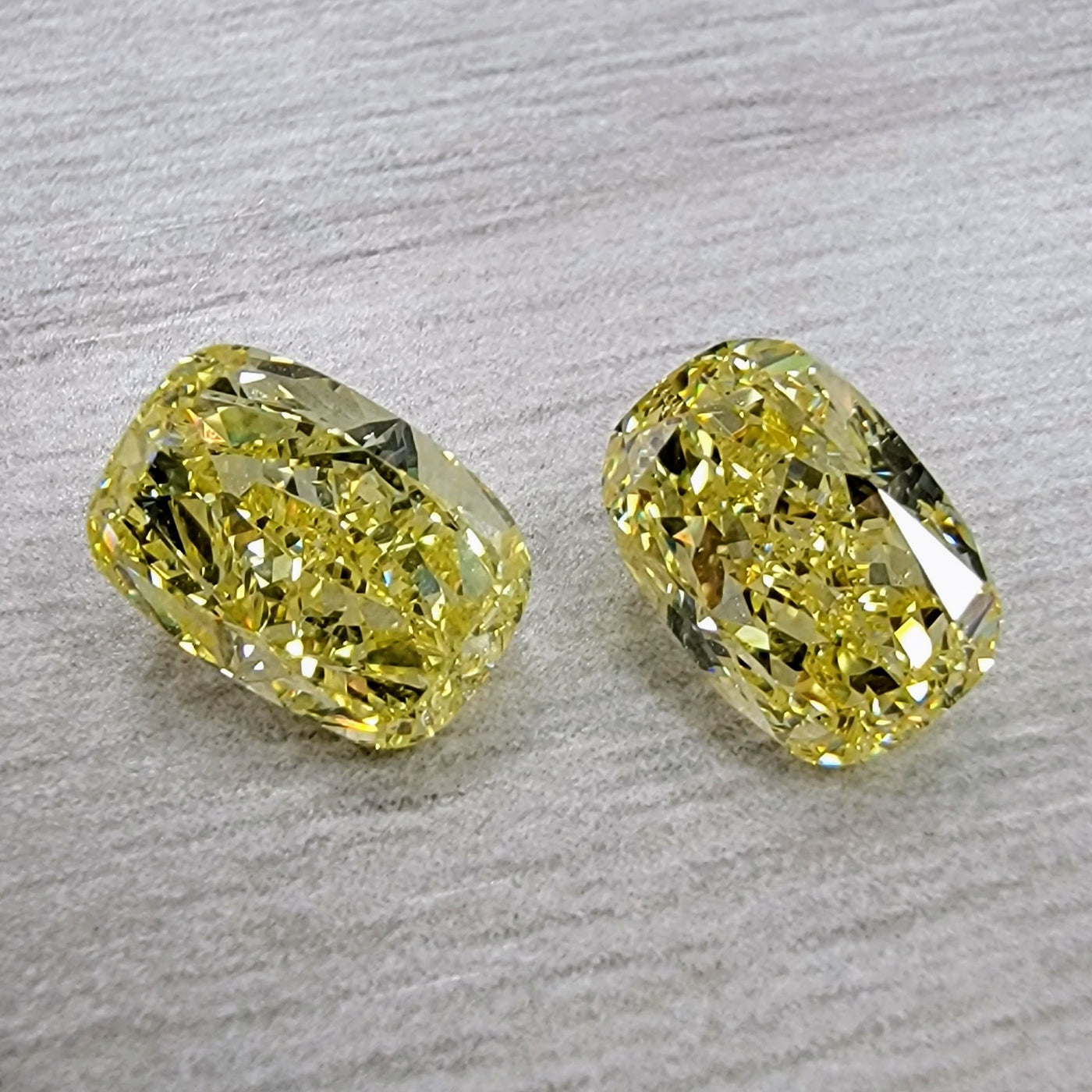 1.80ct & 1.84ct Fancy Intense Yellow Elongated Cushion VS GIA