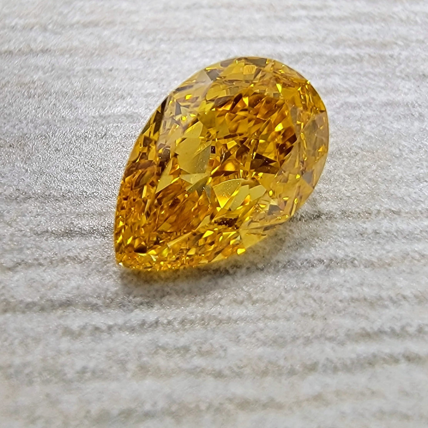 0.50ct Fancy Vivid Yellow Orange Pear SI1 GIA