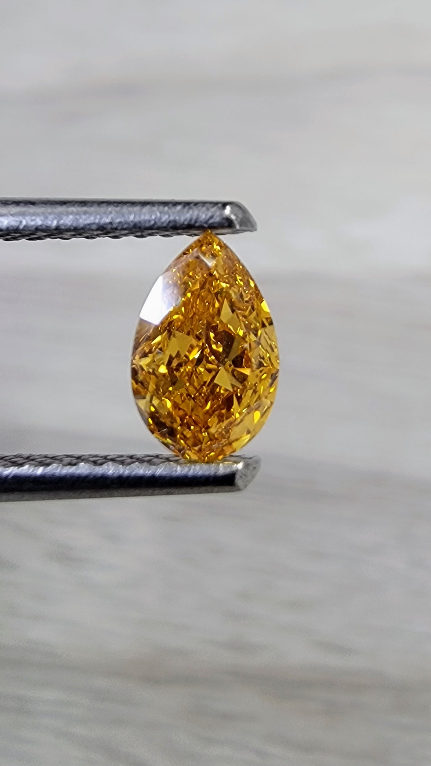 0.50ct Fancy Vivid Yellow Orange Pear SI1 GIA