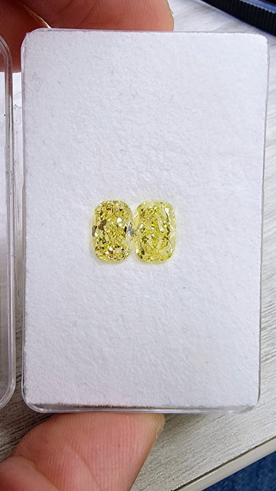 1.80ct & 1.84ct Fancy Intense Yellow Elongated Cushion VS GIA